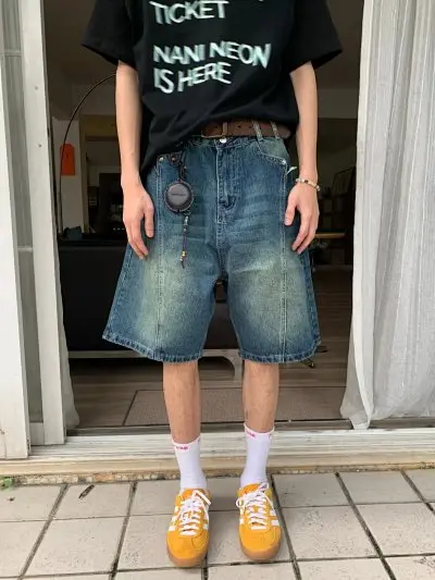 American retro washed distressed blue denim shorts for men, high street fashion brand, loose-fitting straight leg, five-quarter length.