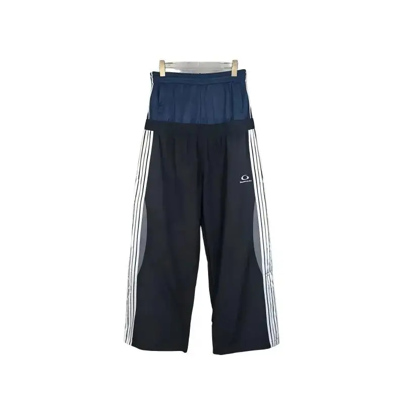 Authentic high-quality B brand 26SS new color-block patchwork double-waistband embroidered logo loose-fit athletic trousers.